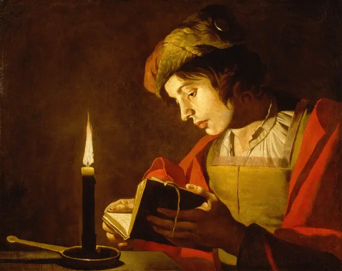 Junger Mann liest bei Kerzenlicht, Ölgemälde von Matthias Stom, um 1630. Lust zu lernen